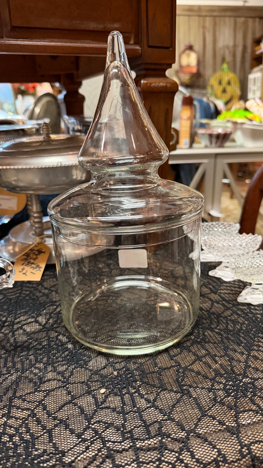 Vintage clear glass apothecary jar with tall pointed lid