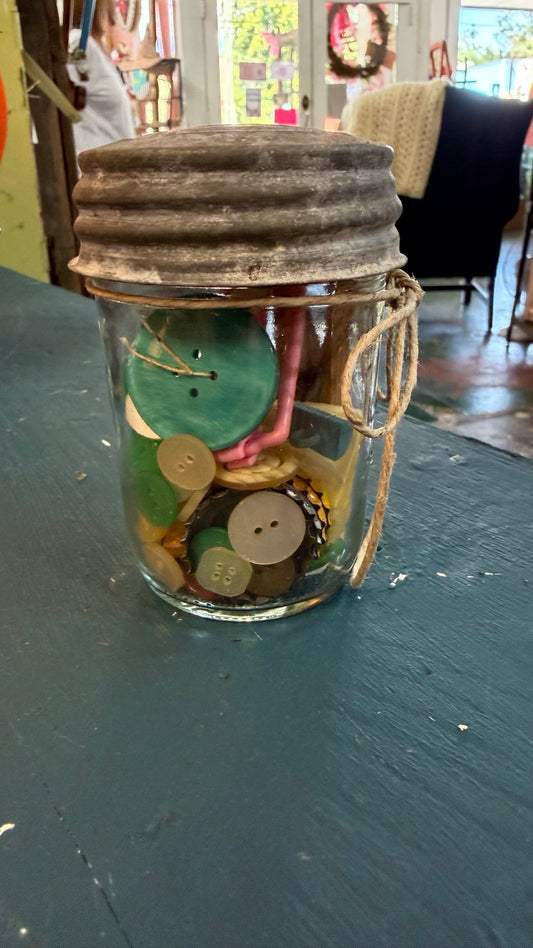 Glass button jar with rustic zinc-style lid